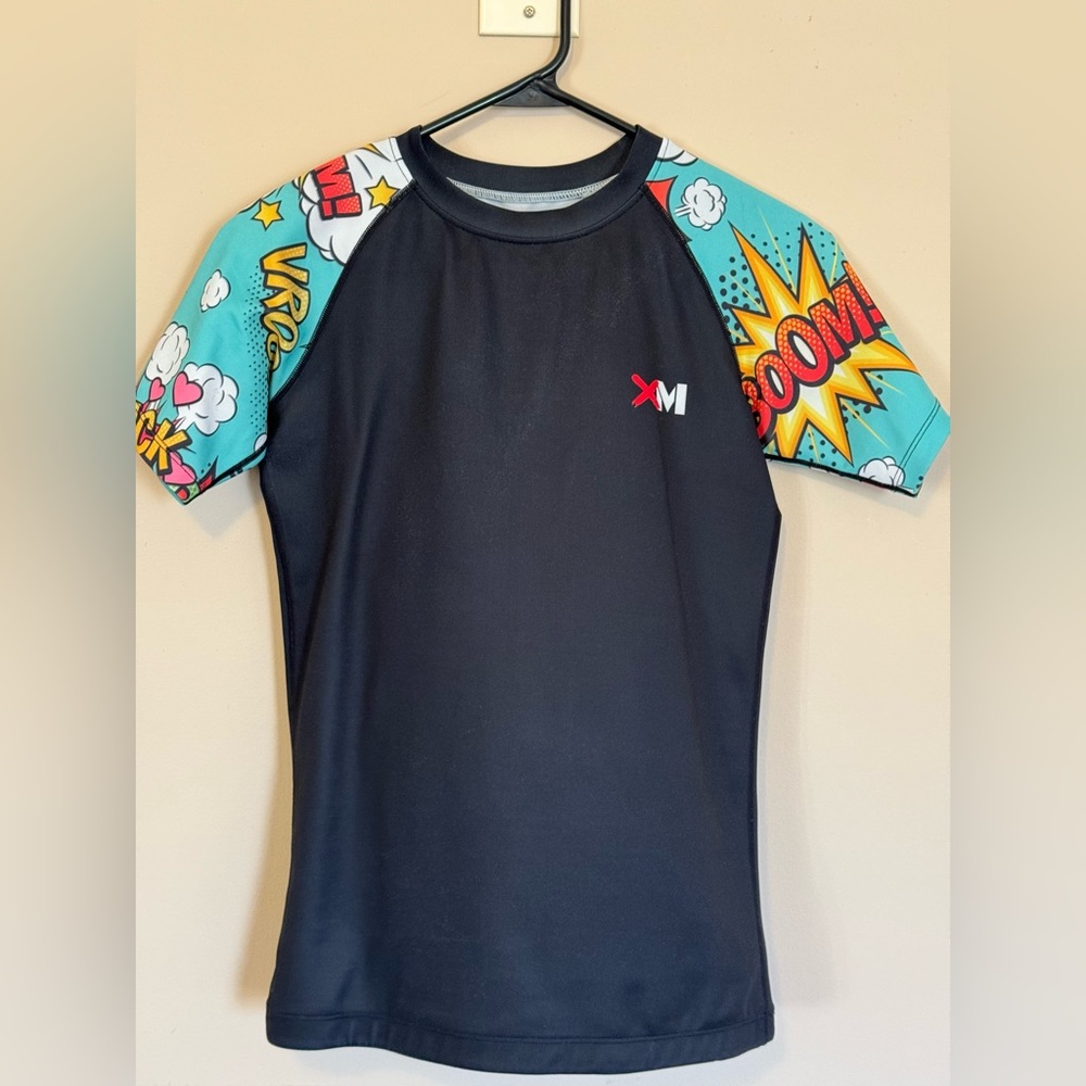 Xmartial women’s rashguard - Comic Book sleeves. Medium. Excellent condition!